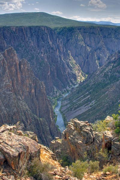 The slopes of Black Canyon split by Gunnison River