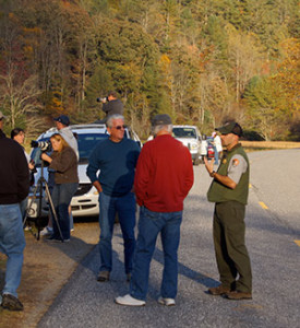 Yarkovich (right) speaks with park visitors in Great Smoky Mountains National Park