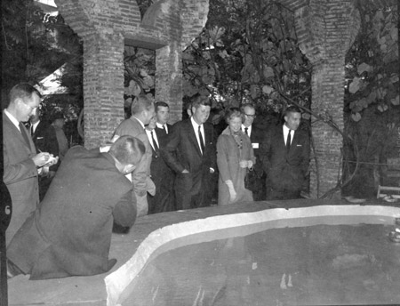 President Kennedy with Dr. and Mrs. Pinchot at the Finger Bowl where historic conversations were held.