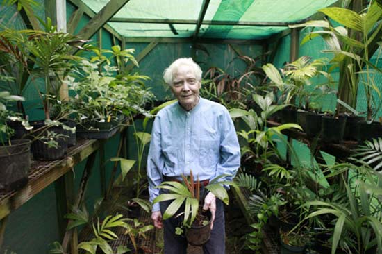 William S. Merwin in the greenhouse. 