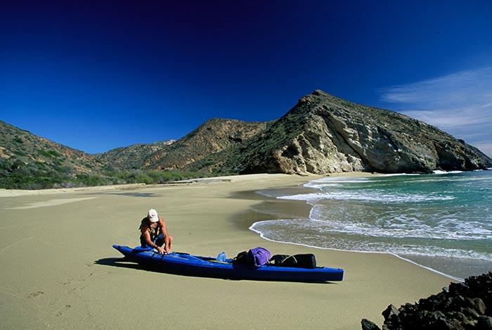 Chuck Graham on Santa Cruz Island with kayak