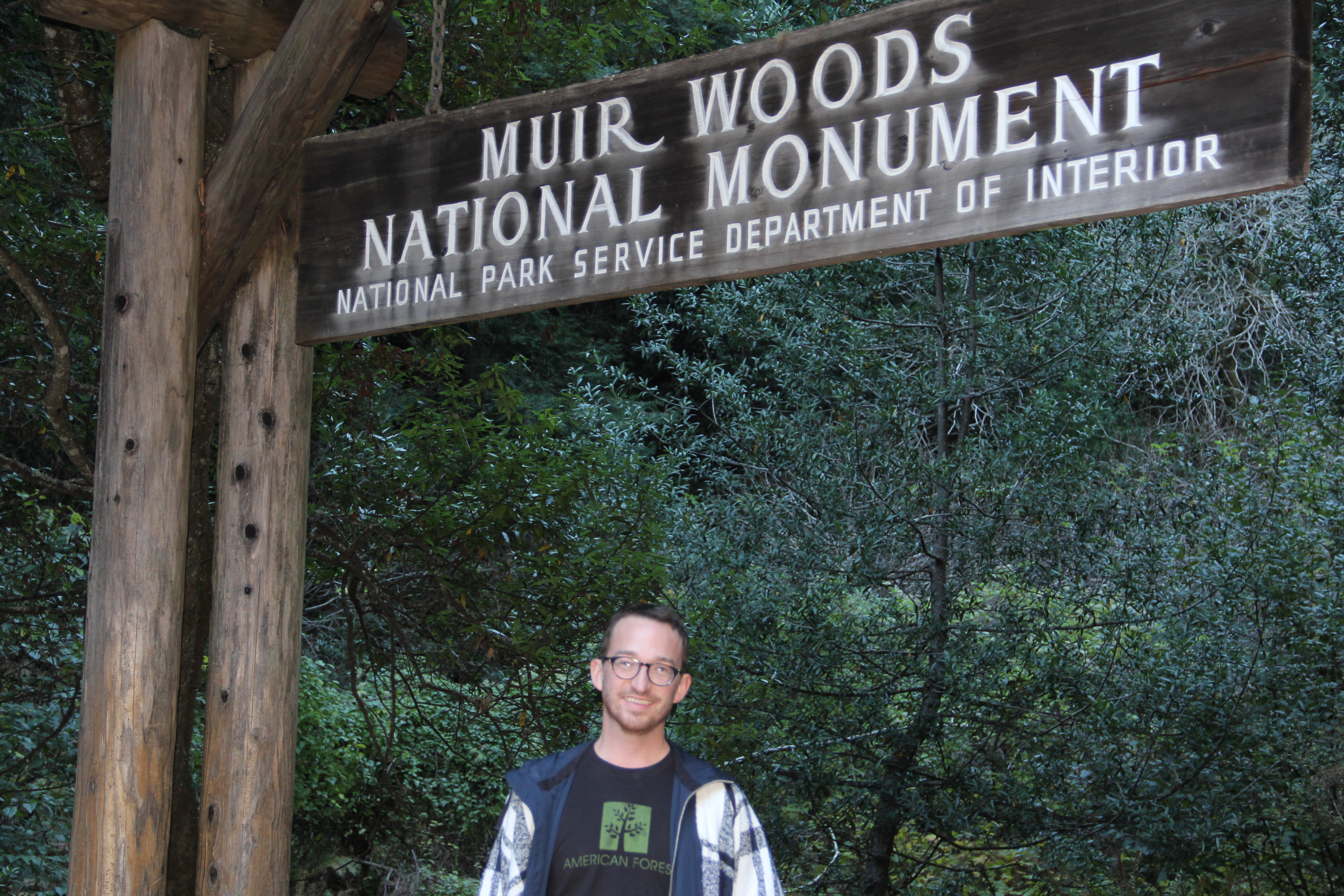 Christopher Horn at entrance to Muir Woods National Monument.