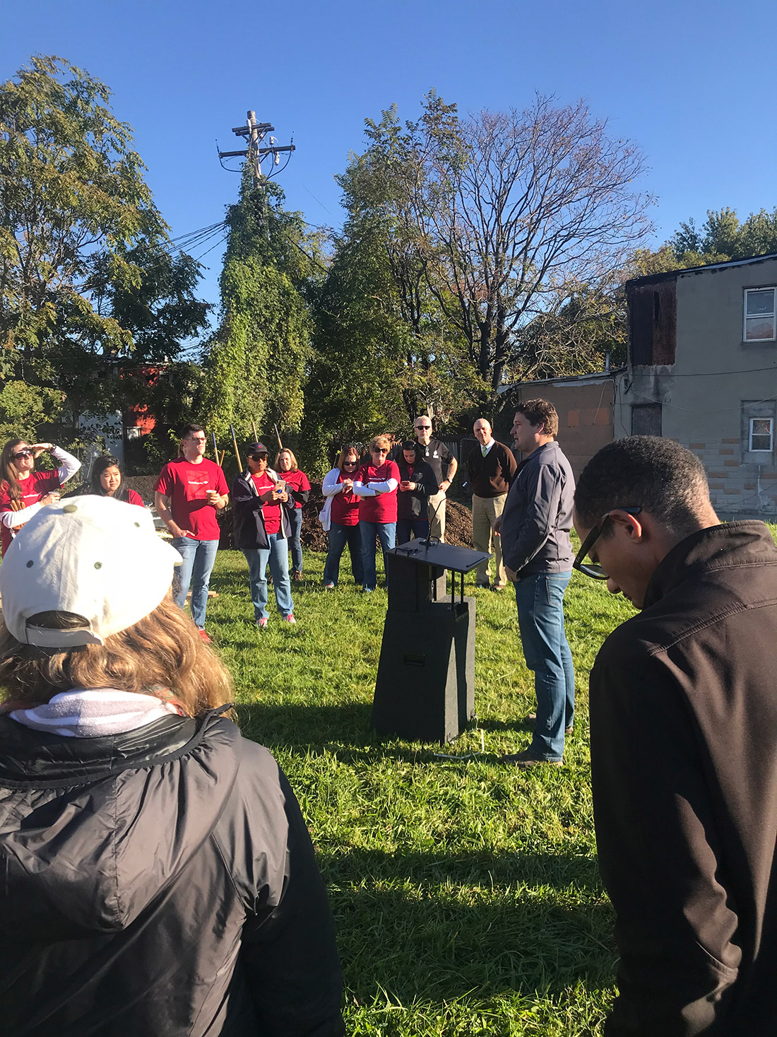 Ian Leahy, American Forests’ director of urban forests programs, shares with Bank of America volunteers about the effects this project will have on the neighborhood.