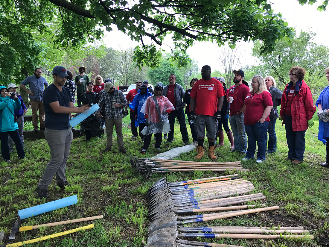 Volunteers from Bank of America gather before planting 200 seedlings in Detroit in May 2018.