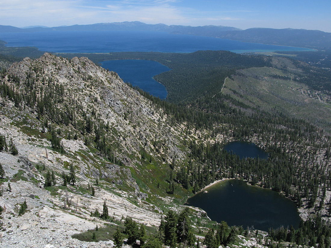 The Angora Lakes are in the foreground, and the ridge where Bunnett stopped the Angora Fire is clearly visible, with Fallen Leaf Lake off to the left and Lake Tahoe in the distance.