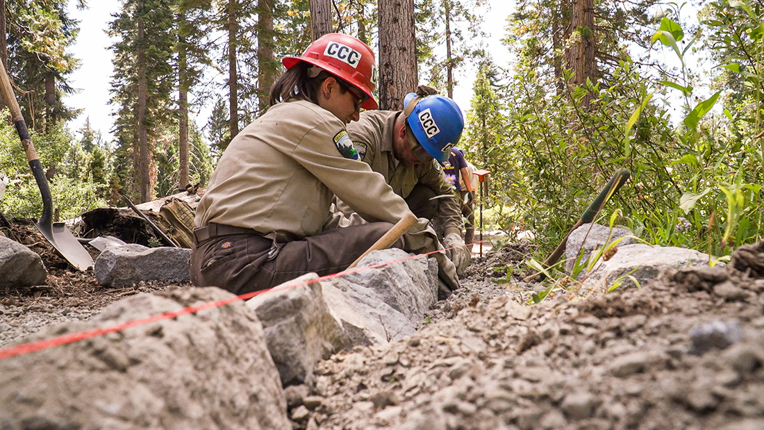 California Conservation Corps members rebuild a trail around Madora Lake in Pluma- Eureka State Park near Graeagle, Calif., to meet Americans with Disabilities Act (ADA) accessibility standards.