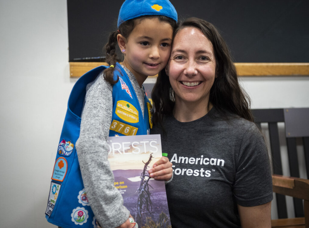 Dr. Libby Pansing poses with a young Girl Scout following a film screening of "Hope and Restoration - Saving the Whitebark Pine" hosted by American Forests at the Montana Science Center on Saturday, March 5, 2023 in Bozeman, Mont.
