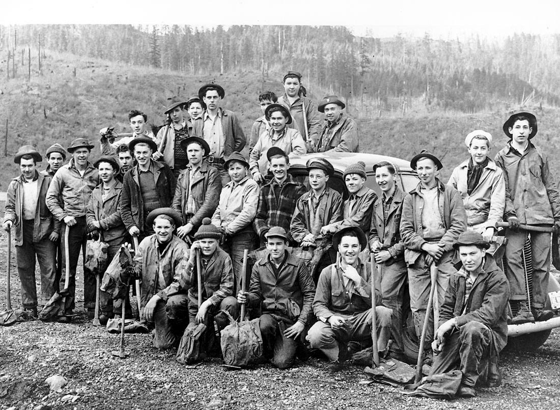 A group of high school boys from Hillsboro, Forest Grove and Timber, Ore., preparing to replant a section of the Tillamook Burn in March 1945.