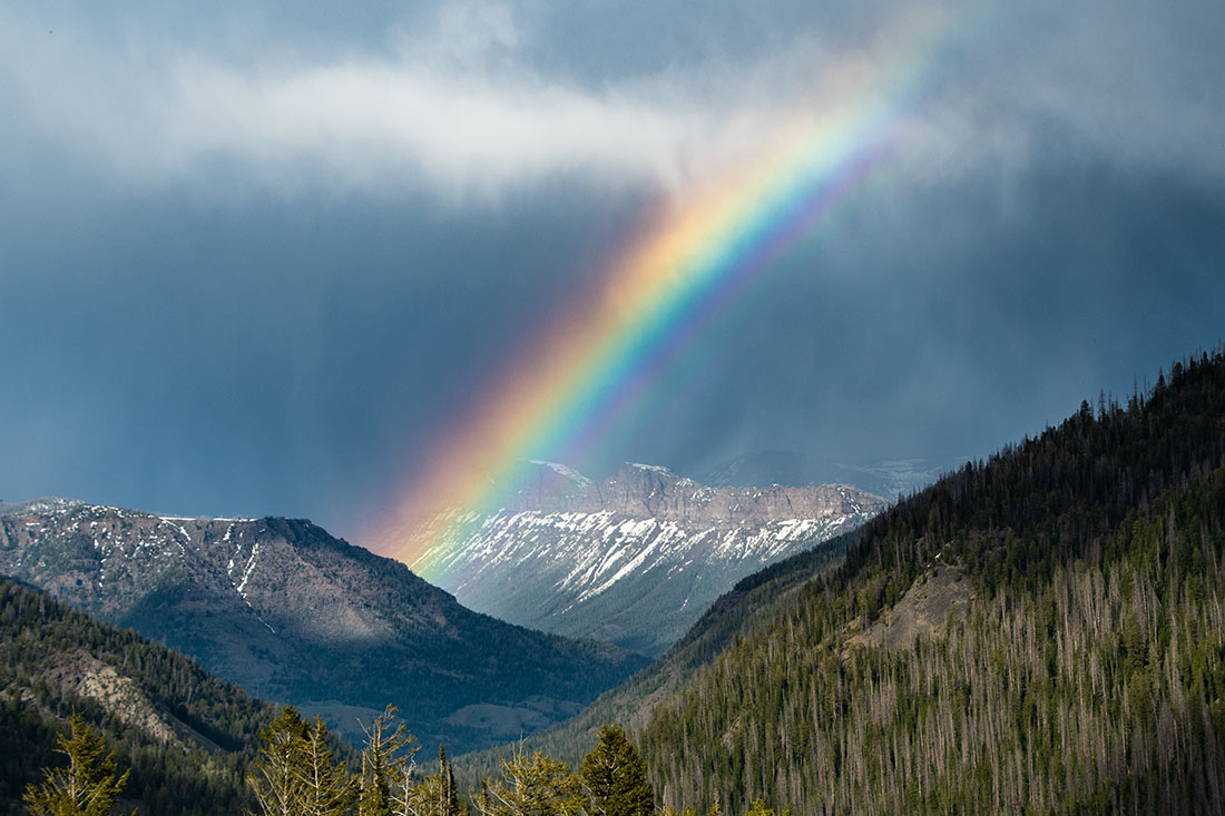 Rainbow over mountain