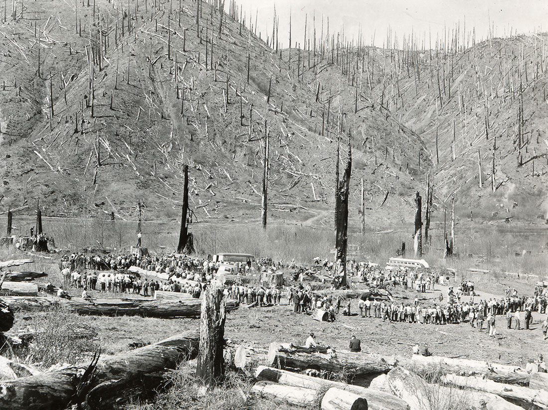 Schoolchildren gather on an old log landing, before helping replant the Tillamook Burn in the 1950s. “The Burn” is a major part of Oregon’s history, with the replanting effort involving thousands of volunteers from across the state.