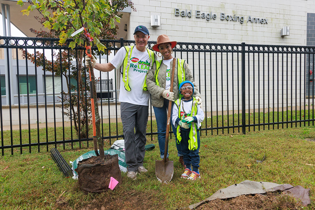 American Forests President and CEO Jad Daley stands with social media influencer Ayana Bailey and her son at a ZYRTEC®-sponsored planting in Washington, D.C. By engaging influencers and celebrities, ZYRTEC® hopes to elevate the issue of Tree Equity and get others involved.