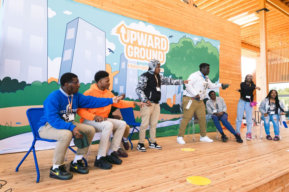 On October 12, 2023, students close out the Upward Ground summit in Washington, D.C. by participating in a climate-themed improv game called “Kick ‘Em Out the Classroom.” Jada M Imani / American Forests