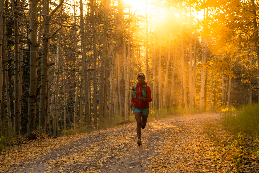Dani Reyes-Acosta running along a forest service road in the San Juan National Forest, Colorado. CREATOR Matthew Tangeman