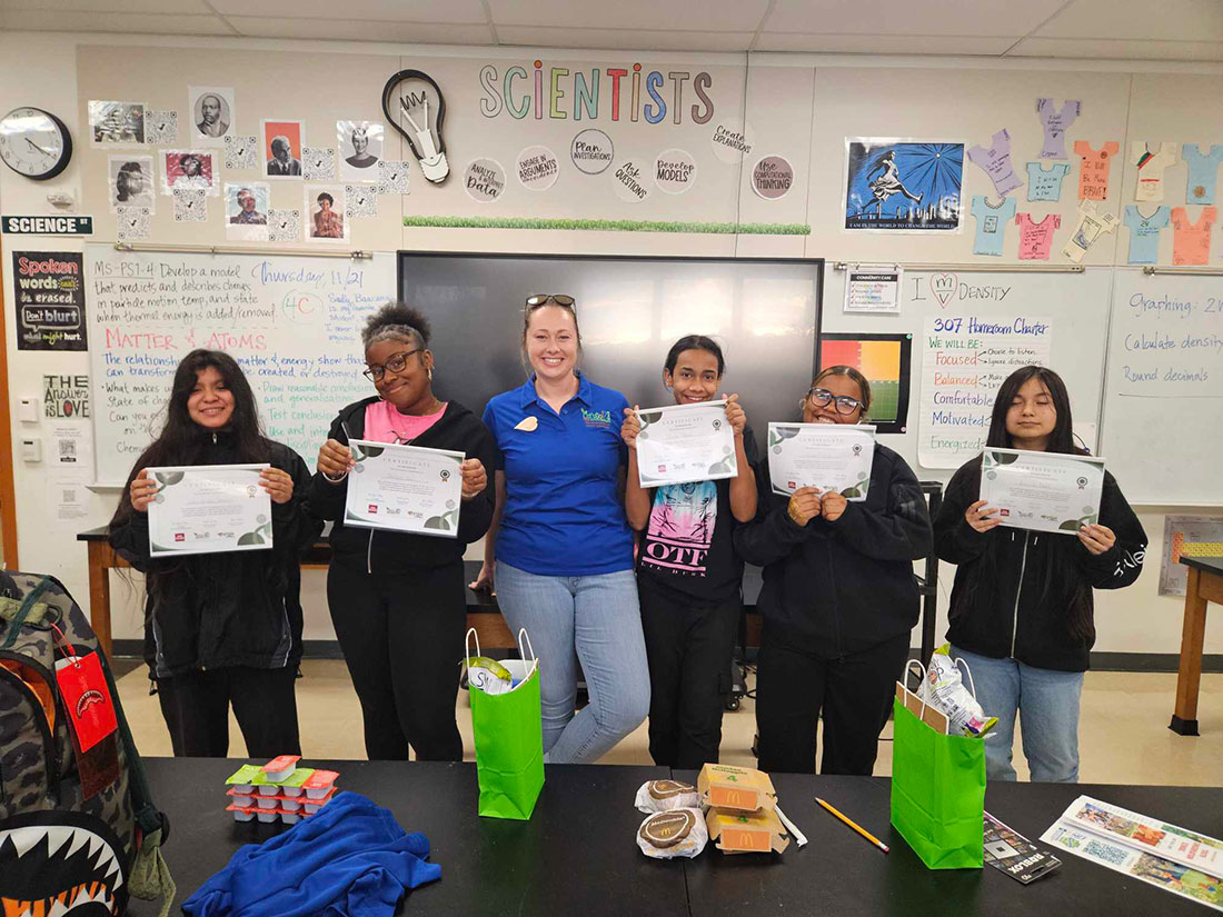 Educator Stevie Kitching celebrates a successful introduction to Tree Equity with some of her students from Hazel Jackson Middle School in Lancaster, Pa.